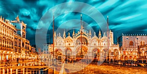 Square of the Holy Mark Piazza San Marco and St. Mark`s Cathedral Basilica di San Marco at the night time. Venice, Italy