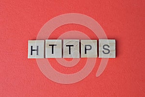 Square letters with text HTTPS isolated on a red background