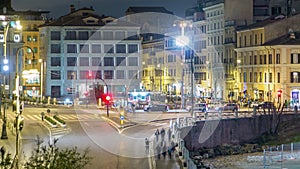 Square near Colosseum illuminated at night timelapse in Rome, Italy