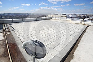 Square observation deck with lighting on tall