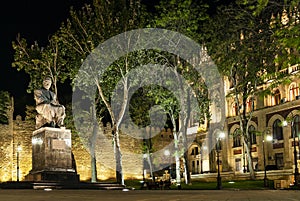 Square in old town of baku azerbaijan with monument of Mirza Ala