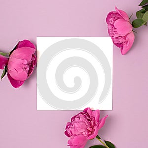 Square paper card mockup with frame made of peony flowers