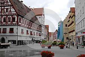 Square and pedestrian street in the center in the town of Nordlingen in Germany photo