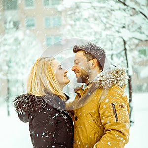 Square photo of betrothed couple in love looking at each other a