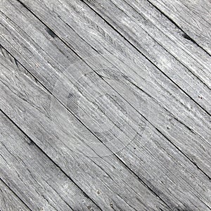 Square picture of old rough gray wooden planks diagonally placed