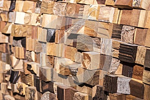 Square pieces of wood spread out in a chaotic manner