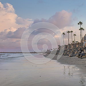 Square Puffy clouds at sunset Panoramic view of the beach at Oceanside in California during su