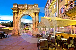 Square in Pula with historic Roman Golden gate street view