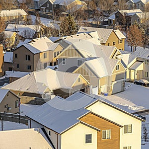 Square Residential neighborhood in the valley with homes on a white landscape of snow