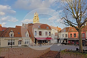Square with terraces and tower of the church of our lady, Bruges
