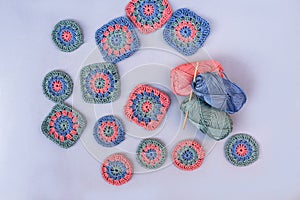 Square and round crochet patterns, three skeins of cotton with wooden hook.