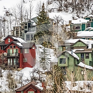 Square Scenic winter landscape with colorful houses built on the snowy mountain slope