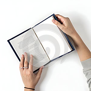 Square-shaped book with hands isolated on white background