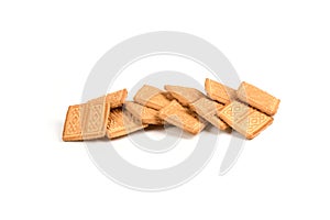 Square shortbread cookies isolated on white background. Stacked butter biscuits for coffee or tee