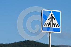 Square sign indicating a pedestrian crossing photo