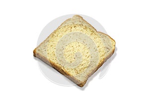 Square slice of fresh whole grain meal bread. Detailed bread texture