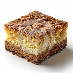 A square sponge cake on a white background, showing off its softness and delicate texture.