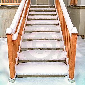 Square Stairs leading to the front porch and door of a home in Daybreak Utah