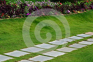 Square stone pathway in garden