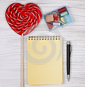 Square top view, woman still life, desk with notepad