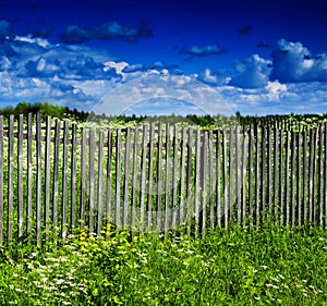 Square vivid summer village fence horizon cloudscape background