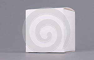 Square white carton product box mock up, side view, clipping path. Clean white cardboard blank mock up. Simple closed