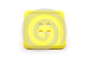 A square yellow button