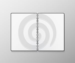 Squared paper notebook isolated on gray background.
