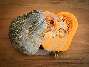 Squash on a cutting board with a kinfe