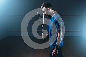 Squash game concept, male player with racket