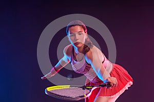 Squash player on a squash court with racket. Man athlete with racket on court. Download a high quality photo for the