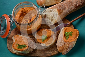 Squash puree squash caviar in a glass jar and on  slices of bread