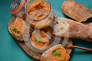 Squash puree squash caviar in a glass jar and on  slices of bread