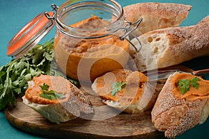 Squash puree squash caviar in a glass jar and on  slices of bread