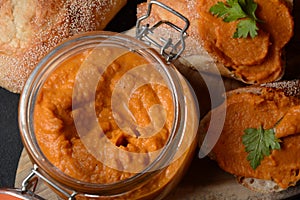 Squash puree squash caviar in a glass jar and on  slices of bread