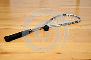 Squash racket and ball photo
