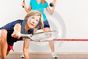 Squash racket sport in gym