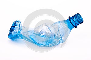 Squashed plastic blue bottle
