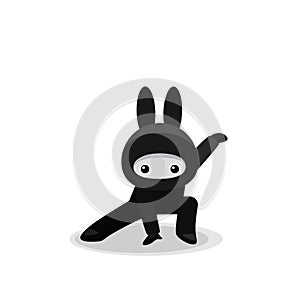 Squatting cute bunny ninja isolated on white background