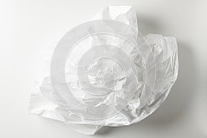 Squeeze a crumpled foam sheet isolated on white background with copy space