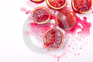 Squeezed Sliced Ripe Juicy Sicilian Blood Oranges on White Background Tasty Oranges Wooden Squeezer Horizonta Top View