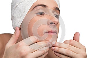 Squeezing a pimple photo