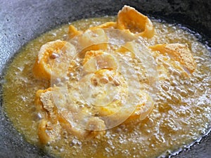 Squid cut into small pieces and fried with flour.