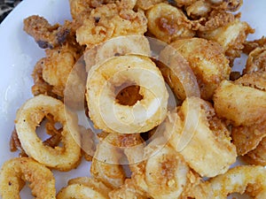 Squid cut into small pieces and fried with flour.