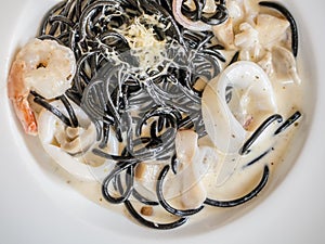 Squid ink spaghetti seafood carbonara