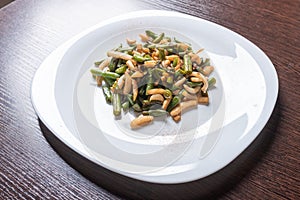 Squid salad with beans on a plate