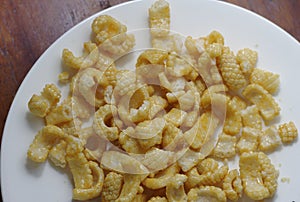 Squid snacks In white plate wooden floo photo