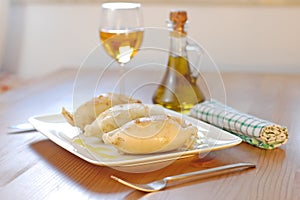 Squids on a white plate