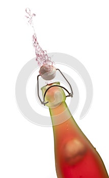 Squirting liquid out of a swing-top bottle photo