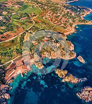 Sraight-down view from flying drone of Tonnara di Scopello. Spectacular summer scene of Sicily, Italy, Europe. Wonderful morning s